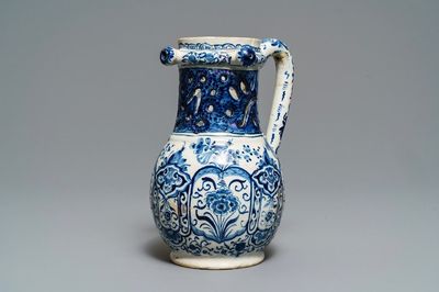 A Dutch Delft blue and white puzzle jug, dated 1737