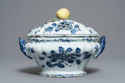 A Dutch Delft blue and white soup tureen with reticulated apple-topped cover, 18th C.
