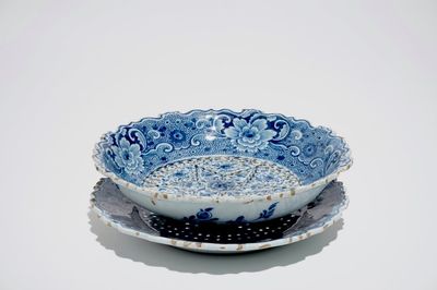 A Dutch Delft blue and white strawberry strainer on stand, 18th C.