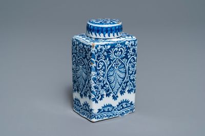 A Dutch Delft blue and white tea caddy with screw cap, late 17th C.