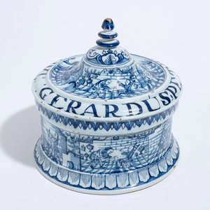 A Dutch Delft blue and white tobacco box and cover with tamper, dated 1763 — photo 1