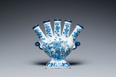 A Dutch Delft blue and white tulip vase with floral design, 18th C.