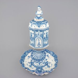 A Dutch Delft blue and white wall cistern with basin, 18th C. — photo 1