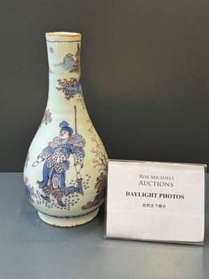A Dutch Delft blue, white and manganese chinoiserie bottle vase, late 17th C. — photo 1