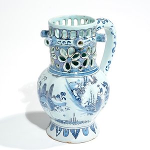 A Dutch Delft blue, white and manganese chinoiserie puzzle jug, dated 1690 — photo 1
