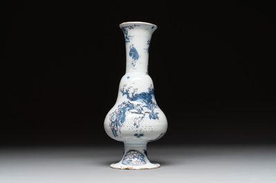 A Dutch Delft blue, white and manganese pear-shaped chinoiserie vase, late 17th C.
