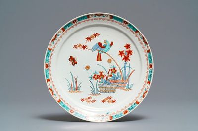 A Dutch Delft doré Kakiemon-style plate with a parrot, early 18th C.