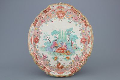 A Dutch Delft doré petit feu plaque with a romantic scene, early 18th C.