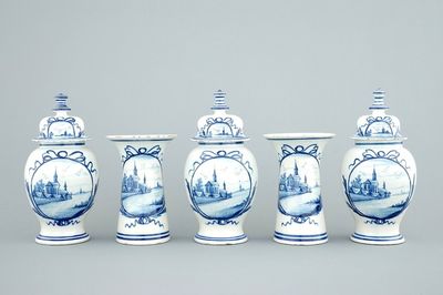 A Dutch Delft five-piece vase garniture with landscape scenes, 18th C.