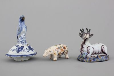 A Dutch Delft polychrome model of a seated deer 18th C.