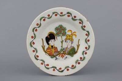 A Dutch Delft polychrome orangist double royal portrait plate, 18th C.