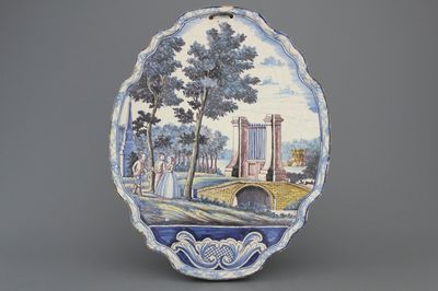 A Dutch Delft polychrome plaque, 19th C.