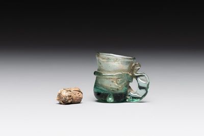 A Dutch or German green glass reliquary holder, excavated in Maastricht, 16/17th C.