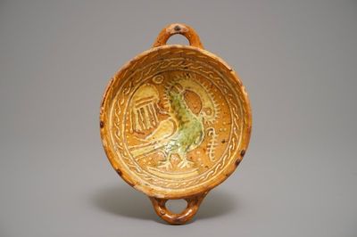 A Dutch slipware porringer with a mythical bird, Northern Netherlands, 1st half 17th C.