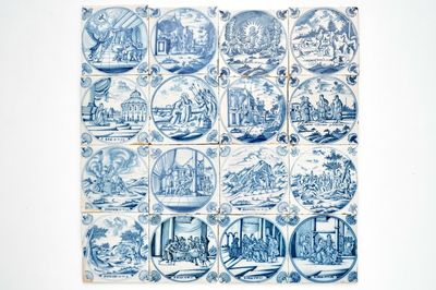 A field of 16 Dutch Delft blue and white biblical tiles with carnation corners, 18th C.