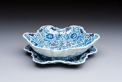 A fine blue and white Dutch Delft strawberry strainer and stand, 18th C.