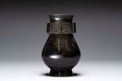 A fine Chinese archaistic bronze 'touhu' vase with 'taotie' design, 17/18th C.