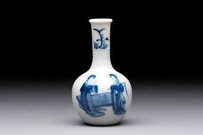 A fine Chinese blue and white miniature bottle vase with two ladies in a garden, jade 玉 mark, Kangxi
