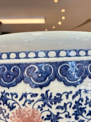A fine Chinese blue, white and copper-red 'lotus scroll' fish bowl, Qianlong — photo 11