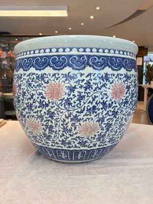 A fine Chinese blue, white and copper-red 'lotus scroll' fish bowl, Qianlong — photo 2