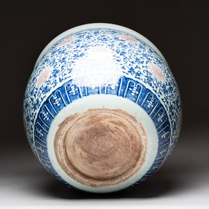 A fine Chinese blue, white and copper-red 'lotus scroll' fish bowl, Qianlong — photo 7