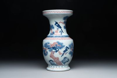 A fine Chinese blue, white and copper-red 'magpie and pine tree' vase, Yongzheng/Qianlong