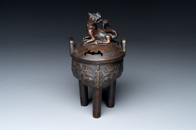 A fine Chinese bronze censer and cover with a Buddhist lion, 'ding 鼎', Xuande Mark, Ming