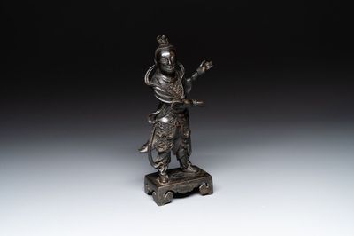 A fine Chinese bronze figure of a divinity, Ming
