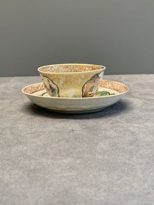 A fine Chinese Canton famille rose 'mandarin subject' cup and saucer, Qianlong — photo 2