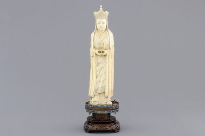 A fine Chinese carved ivory deity with an incense burner on a cloisonne and silver inlaid stand, 19th C.