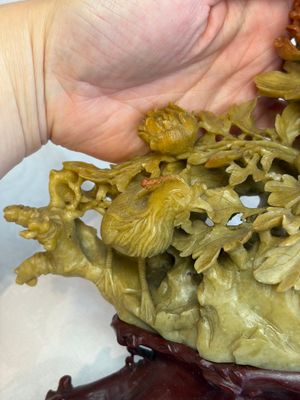A fine Chinese carved soapstone 'Squirrels and Grapes' group and a 'Phoenixes among Peonies' group, 20th C. — photo 16