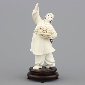 A fine Chinese Cultural Revolution carved ivory figure of a girl — photo 1