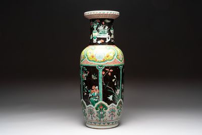 A fine Chinese famille noire 'antiquities' vase, 19th C.