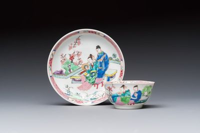 A fine Chinese famille rose cup and saucer with a couple on a terrace, Yongzheng/Qianlong