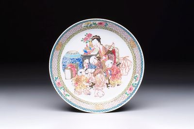 A fine Chinese famille rose eggshell plate with a lady and playing boys, Yongzheng