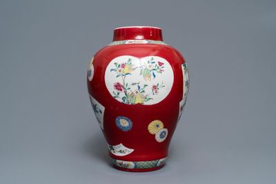 A fine Chinese famille rose ruby ground baluster vase with floral panels, Yongzheng