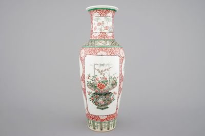 A fine Chinese famille verte and iron red porcelain vase with flowers in a basket, 19th C.