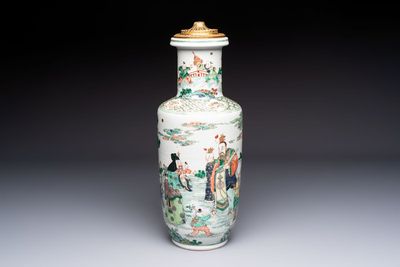 A fine Chinese famille verte 'Sanxing' rouleau vase with a gilt-bronze mount, Qing