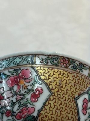 A fine Chinese gilt-decorated famille rose 'flower basket' cup and saucer, Yongzheng — photo 12