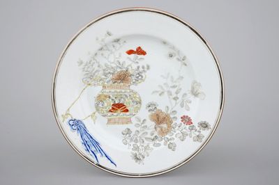 A fine Chinese grisaille and gilt flower basket plate, early 18th C.