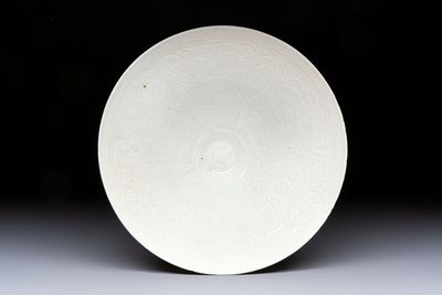 A fine Chinese qingbai conical bowl with incised floral design, Song