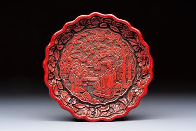 A fine Chinese red cinnabar lacquer flower-shaped 'Xi Wang Mu 西王母' dish, Ming