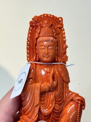 A fine Chinese red coral sculpture of Guanyin seated on a lotus throne on a wooden stand, 19/20th C. — photo 6