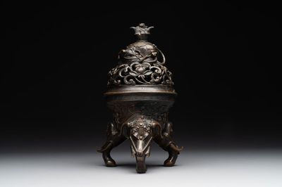 A fine Chinese tripod 'elephant' censer and cover, Ming