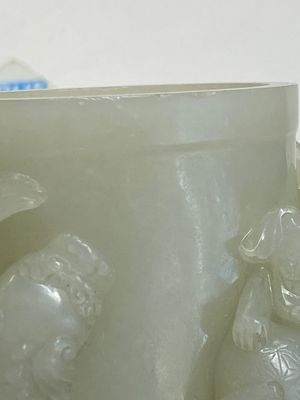 A fine Chinese white jade 'buddhist lions' vase and cover, Qing — photo 13