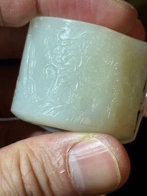 A fine Chinese white jade inscribed archer ring, Zigang 子岡 mark, 18th C. — 照片 25