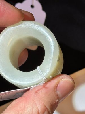 A fine Chinese white jade inscribed archer ring, Zigang 子岡 mark, 18th C. — 照片 34