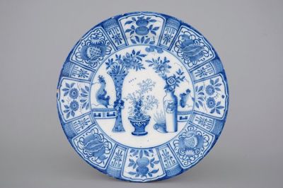 A fine Dutch Delft blue and white chinoiserie dish with "antiquities", late 17th C.