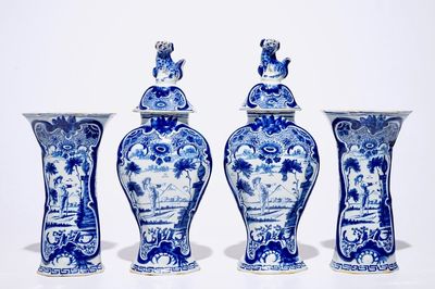 A fine Dutch Delft blue and white four-piece garniture with a farmer, 2nd half 18th C.