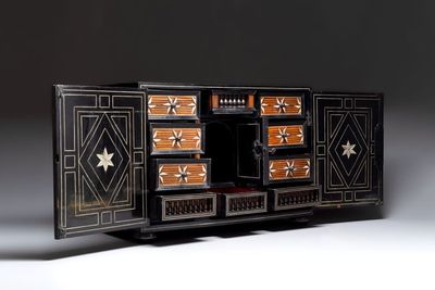 A fine ebony-veneered bone-inlaid cabinet, probably Italy, 19th C.